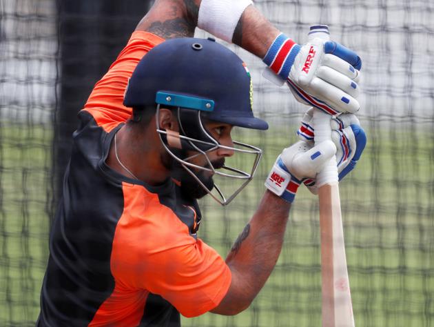 Indian captain Virat Kohli is right behind the ball (Action Images via Reuters)
