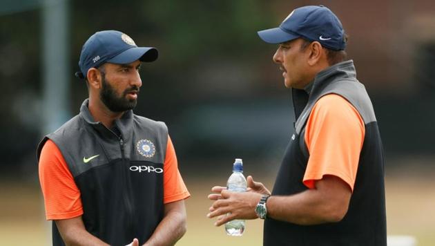 File photo: India head coach Ravi Shastri speaks to Cheteshwar Pujara during nets on July 30, 2018. (Action Images via Reuters) File photo: India head coach Ravi Shastri speaks to Cheteshwar Pujara during nets on July 30, 2018. (Action Images via Reuters)