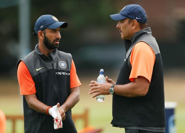 Cheteshwar Pujara in a conversation with coach Ravi Shastri (Action Images via Reuters)