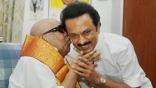DMK chief M Karunanidhi (L) with his son MK Stalin in Chennai on March 1, 2015.(PTI file photo)