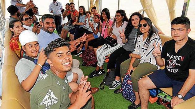 Visiting students during a field trip to Sukhna Lake, Chandigarh, on Wednesday.(HT Photo)