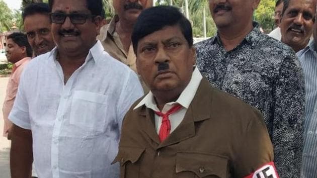 Telegu Desam Party MP and former actor Naramalli Sivaprasad dressed up as Adolf Hitler in Parliament.(ANI Twitter)