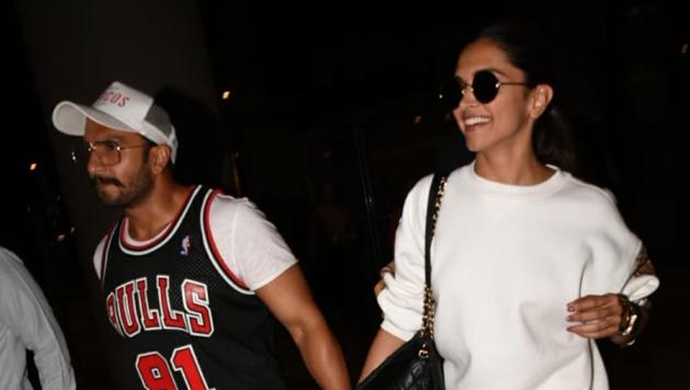 Deepika Padukone and Ranveer Singh were spotted hand in hand at the airport in Mumbai.(Viral Bhayani)