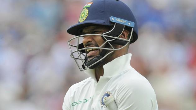 India's Shikhar Dhawan reacts after being dismissed during the third day of the first test cricket match between England and India at Edgbaston.(AP)