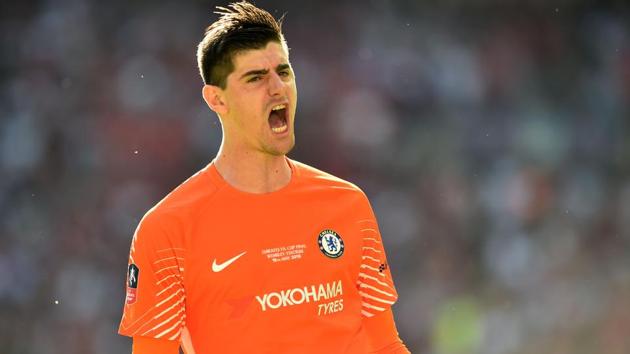 Chelsea's Belgian goalkeeper Thibaut Courtois celebrates after Chelsea's Belgian midfielder Eden Hazard opens the scoring from the penalty spot during the English FA Cup final football match between Chelsea and Manchester United.(AFP)