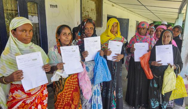 People queue at the office to verify and check their names in the final draft of the National Register of Citizens (NRC), at Morigoan on Saturday, Aug 4, 2018(PTI)