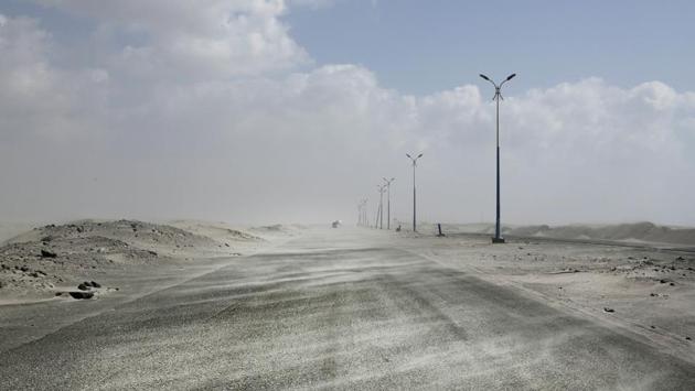 Sand drifts over an empty highway from Abyan province to the city of Aden. “The United States is certainly in a bind in Yemen,” said Katherine Zimmerman, a research fellow at the American Enterprise Institute. “It doesn’t make sense that the United States has identified al-Qaida as a threat, but that we have common interests inside of Yemen and that, in some places, it looks like we’re looking the other way.” (Nariman El-Mofty / AP File) Sand drifts over an empty highway from Abyan province to the city of Aden. “The United States is certainly in a bind in Yemen,” said Katherine Zimmerman, a research fellow at the American Enterprise Institute. “It doesn’t make sense that the United States has identified al-Qaida as a threat, but that we have common interests inside of Yemen and that, in some places, it looks like we’re looking the other way.” (Nariman El-Mofty / AP File)