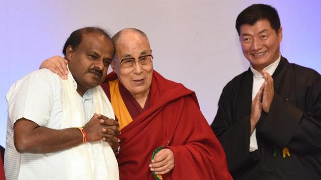 Tibetan spiritual leader Dalai Lama poses for photographs along with chief minister of Karnataka, H D Kumarswamy as Dr Lobsang Sangye, the President of Central Tibetan Administration, Dharmashala looks on during the celebration of ‘Thank You Karnataka Day’, organised by Tibetans living in Karnataka, at Taj West End, in Bengaluru. (Arijit Sen / HT Photo) Tibetan spiritual leader Dalai Lama poses for photographs along with chief minister of Karnataka, H D Kumarswamy as Dr Lobsang Sangye, the President of Central Tibetan Administration, Dharmashala looks on during the celebration of ‘Thank You Karnataka Day’, organised by Tibetans living in Karnataka, at Taj West End, in Bengaluru. (Arijit Sen / HT Photo)