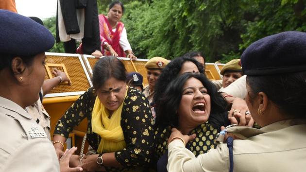 Police personnel detain BJP Mahila Morcha activists while protesting against Aam Aadmi Party at Vidhan Sabha, in New Delhi, on August 06, 2018. (Sushil Kumar / HT Photo) Police personnel detain BJP Mahila Morcha activists while protesting against Aam Aadmi Party at Vidhan Sabha, in New Delhi, on August 06, 2018. (Sushil Kumar / HT Photo)