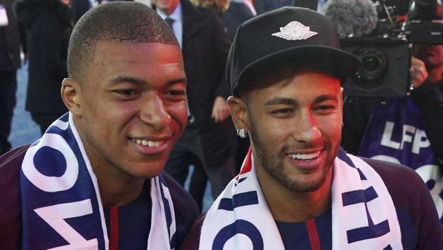 File photo: PSG's Kylian Mbappe (L) and Neymar after the match between Paris Saint-Germain and Stade Rennais at the Parc des Princes stadium in Paris on May 12, 2018. (AP) File photo: PSG's Kylian Mbappe (L) and Neymar after the match between Paris Saint-Germain and Stade Rennais at the Parc des Princes stadium in Paris on May 12, 2018. (AP)
