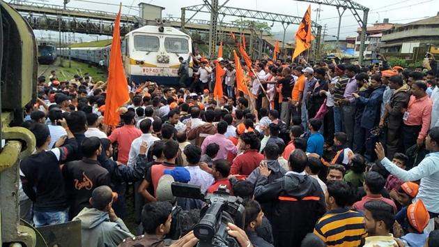At Lonavla, protestors took the agitation further and organised a rail roko protest on Thursday. Commuters were stranded as several trains were delayed. (HT Photo) 