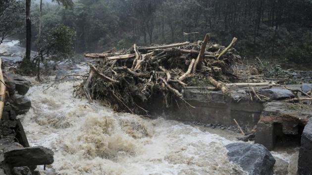 Water gushes out following heavy rain and landslide disrupting connectivity in Kozhikode, Kerala . (AP)