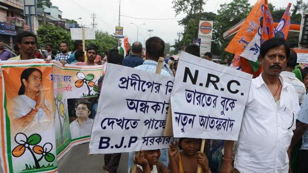 Trinamool Congress supporters protest against the National Register of Citizens (NRC), in Siliguri on August 4, 2018.(AFP File Photo)