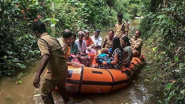 People being taken to safer places following a landslide in Idukki, Kerala. (PTI)
