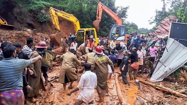 Rescue operations being carried out following a landslide, triggered by heavy rains at Adimali, in Idukki (PTI)