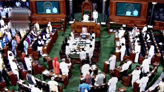 Members stand for the national anthem in the Lok Sabha on the last day of the Monsoon session of Parliament, in New Delhi on Friday. (PTI Photo) Members stand for the national anthem in the Lok Sabha on the last day of the Monsoon session of Parliament, in New Delhi on Friday. (PTI Photo)