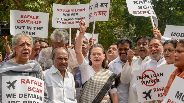 UPA chairperson Sonia Gandhi along with other opposition parties' leaders raises slogans during a protest against the Union government over Rafale deal issue, at Parliament House in New Delhi on Friday, Aug 10, 2018. (PTI) UPA chairperson Sonia Gandhi along with other opposition parties' leaders raises slogans during a protest against the Union government over Rafale deal issue, at Parliament House in New Delhi on Friday, Aug 10, 2018. (PTI)