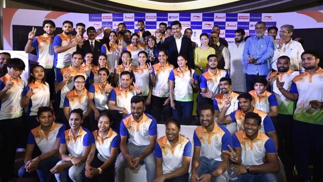 Sports Minister Rajyavardhan Singh Rathore stands for a group photograph with the Indian contingent for the Asian Games 2018, during their send-off ceremony in New Delhi. (Ravi Choudhary / PTI) Sports Minister Rajyavardhan Singh Rathore stands for a group photograph with the Indian contingent for the Asian Games 2018, during their send-off ceremony in New Delhi. (Ravi Choudhary / PTI)