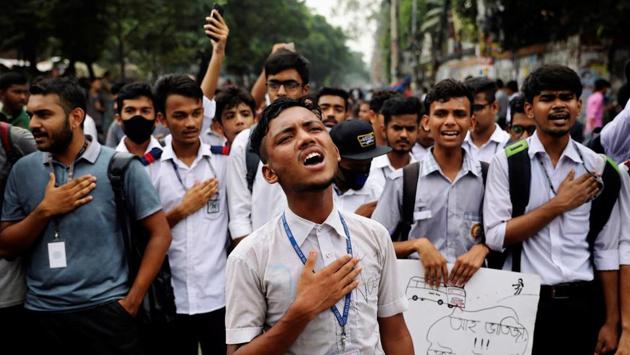 Students sing the national anthem as they take part in a protest over recent traffic accidents that killed a boy and a girl, in Dhaka, Bangladesh. (Mohammad Ponir Hossain / REUTERS) Students sing the national anthem as they take part in a protest over recent traffic accidents that killed a boy and a girl, in Dhaka, Bangladesh. (Mohammad Ponir Hossain / REUTERS)