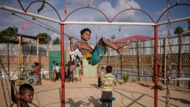 Rohingya refugee children play in a playground in the Thangkhali refugee camp near Cox’s Bazar, Bangladesh. (Ed Jones / AFP) Rohingya refugee children play in a playground in the Thangkhali refugee camp near Cox’s Bazar, Bangladesh. (Ed Jones / AFP)