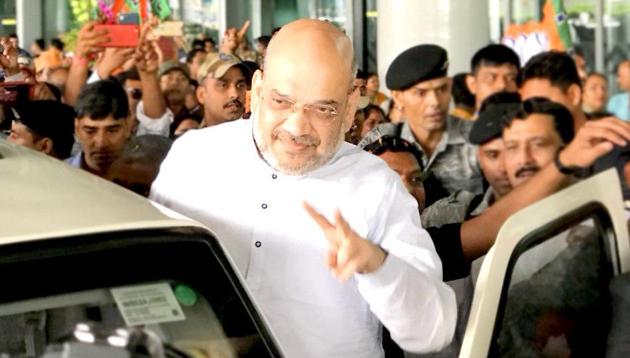 The Kolkata airport became a scene of competition for both the saffron workers and ruling Trinamool Congress supporters laid out their own style of welcome for Amit Shah. (Kailash Vijayvarghiya/Twitter) The Kolkata airport became a scene of competition for both the saffron workers and ruling Trinamool Congress supporters laid out their own style of welcome for Amit Shah. (Kailash Vijayvarghiya/Twitter)