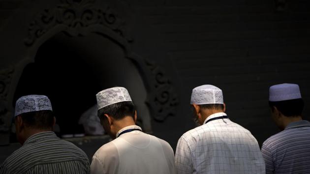 Chinese Hui Muslims pray during Eid al-Fitr prayers at Niujie Mosque in Beijing.(AP File Photo)