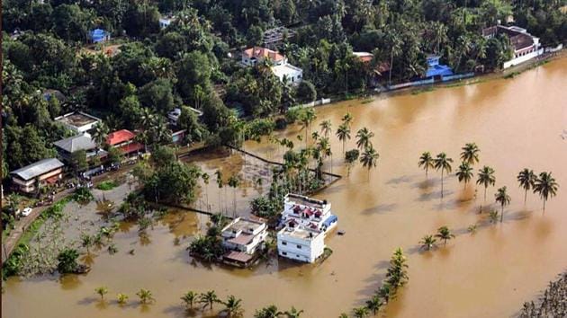 An aeriel view of the flooded locality of Aluva after heavy rains, in Kerala on Friday.(PTI Photo)