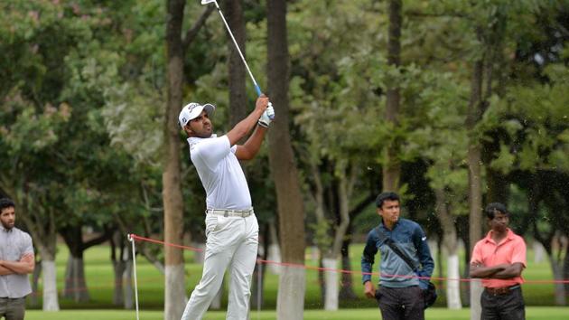 Khalin Joshi of India looks on after playing a shot during the penultimate day of Take Solutions Masters, Asian Tour Championship held at the Karnataka Golf Association in Bangalore on August 11, 2018.(AFP)