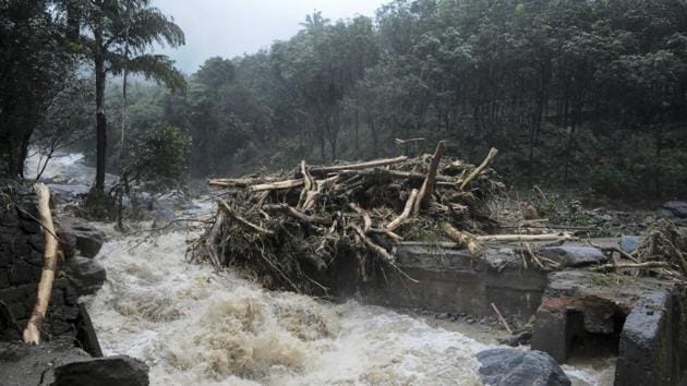 Water gushes out following heavy rain and landslide in Kozhikode, Kerala. (AP Photo) Water gushes out following heavy rain and landslide in Kozhikode, Kerala. (AP Photo)