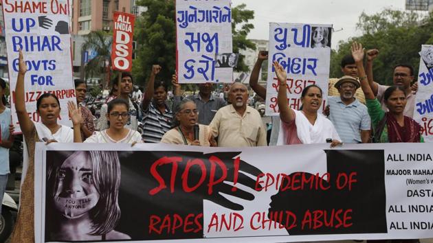 Activists protest the rising incidence of sexual assault against minors across India in Ahmedabad on Wednesday.(AP photo)