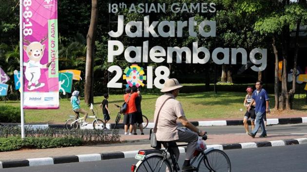File photo: A cyclist rides past an installation promoting the upcoming Asian Games, to be held in Jakarta and Palembang, during the weekly car-free day in Jakarta, Indonesia July 15, 2018.(REUTERS)