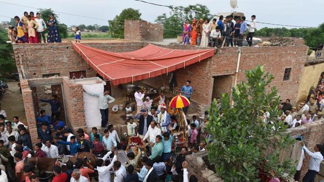 All Jatav wanted, after he was matched with a girl in the adjoining district, was to lead his wedding procession through her village before arriving at her house for the rituals. The Thakurs of Nizampur village wouldn’t hear of it, though. No Dalit man had ever crossed a Thakur home on the way to his wedding; no exception would be made to the rule. (Anushree Fadnavis / HT Photo) All Jatav wanted, after he was matched with a girl in the adjoining district, was to lead his wedding procession through her village before arriving at her house for the rituals. The Thakurs of Nizampur village wouldn’t hear of it, though. No Dalit man had ever crossed a Thakur home on the way to his wedding; no exception would be made to the rule. (Anushree Fadnavis / HT Photo)