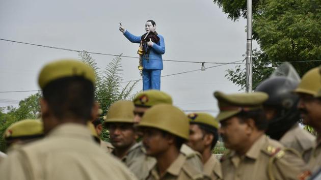 Police personnel prepare for an inspection of the procession’s route a day prior. In a village where the Thakurs outnumber Dalits 9:1, their word was law. Not this time, though. Launching with a petition to the local police station in February, Jatav’s fight for an equal wedding became as important for Nizampur as for the nation at a time when caste conflicts seem to have turned on their axis. (Anushree Fadnavis / HT Photo) Police personnel prepare for an inspection of the procession’s route a day prior. In a village where the Thakurs outnumber Dalits 9:1, their word was law. Not this time, though. Launching with a petition to the local police station in February, Jatav’s fight for an equal wedding became as important for Nizampur as for the nation at a time when caste conflicts seem to have turned on their axis. (Anushree Fadnavis / HT Photo)