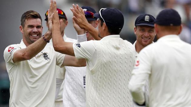 James Anderson (L) celebrates after taking the wicket of Murali Vijay during the second Test between India and England at Lord’s.(AFP)