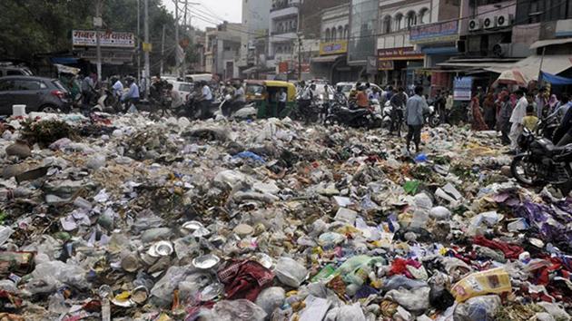 Residents of Sector 15 complain that its streets are littered with waste, and garbage keeps spilling out of trash bins. (Sonu Mehta/ HT pic for representational purposes only) Residents of Sector 15 complain that its streets are littered with waste, and garbage keeps spilling out of trash bins. (Sonu Mehta/ HT pic for representational purposes only)