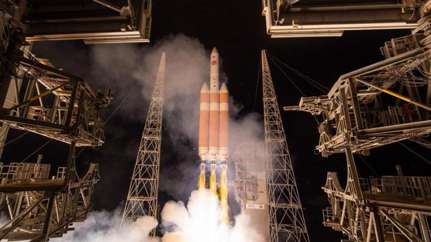 This handout photo released by NASA shows the United Launch Alliance Delta IV Heavy rocket with the Parker Solar Probe onboard during its launch on August 12, 2018, Launch Complex 37 at Cape Canaveral Air Force Station in Florida.(AFP)