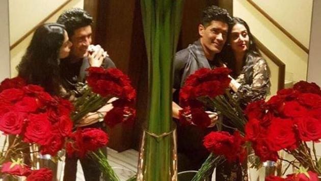 Sridevi plants a kiss on Manish Malhotra’s cheek at her birthday party. (Instagram) 