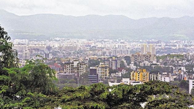 The Ease of living index considered the ‘Physical’ aspect as one of the four main pillars to be judged. This panoramic view of Pune shows the growth with greenery fighting for space.(Pratham Gokhale/HT Photo)