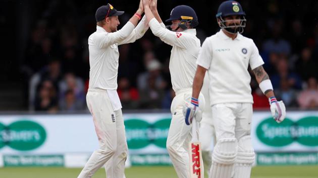 Cricket - England v India - Second Test - Lord’s, London, Britain - August 12, 2018 England's Ollie Pope celebrates with Joe Root after taking a catch to dismiss India's Virat Kohli(Action Images via Reuters)