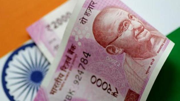 An India Rupee note is seen in this illustration photo. (Reuters File Photo) An India Rupee note is seen in this illustration photo. (Reuters File Photo)