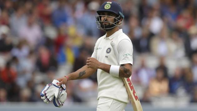 India's captain Virat Kohli leaves the pitch after he is caught by England's Ollie Pope off the bowling of England's Stuart Broad. (AP)