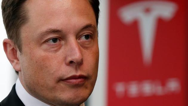 Tesla Motors Inc Chief Executive Elon Musk pauses during a news conference in Tokyo September 8, 2014. (Reuters)