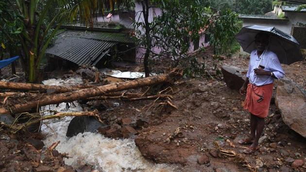 Uprooted tree seen in north Kerala's Kannur district after heavy rains with flash floods hit Kerala, on August 9, 2018.(HT Photo) Uprooted tree seen in north Kerala's Kannur district after heavy rains with flash floods hit Kerala, on August 9, 2018.(HT Photo)