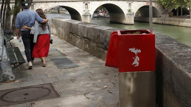 A bright red “urinoir” installed on Ile Saint-Louis, not far from Notre Dame cathedral and overlooking tourist boats passing on the Seine river, has caused indignation among locals.(Reuters)