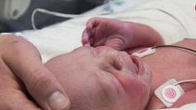 The woman went into labour on the way and delivered the baby, which died soon after the birth. (AP File/Photo for representational purpose) The woman went into labour on the way and delivered the baby, which died soon after the birth. (AP File/Photo for representational purpose)