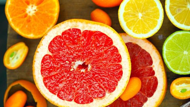 Citrus fruits such as lemons and oranges are acidic and can cause irritation in the stomach lining, leading to digestive problems. Many individuals do not realize that carbonated beverages are also acidic and should be avoided. (Shutterstock)
