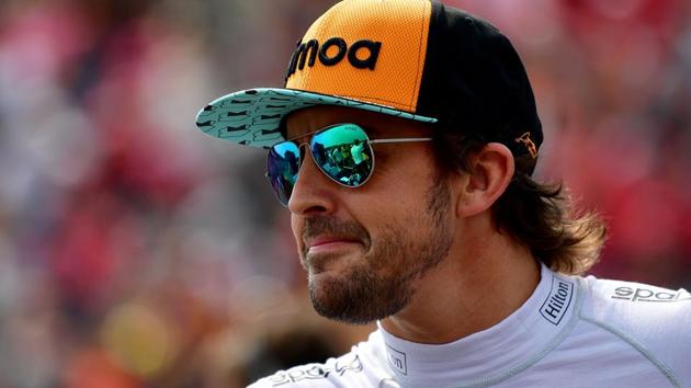 McLaren's Fernando Alonso attends the German Formula One Grand Prix at the Hockenheim racing circuiit.(AFP)