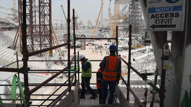 This file photo shows workers on the construction site at Al-Wakrah Stadium in Qatar.(AFP)