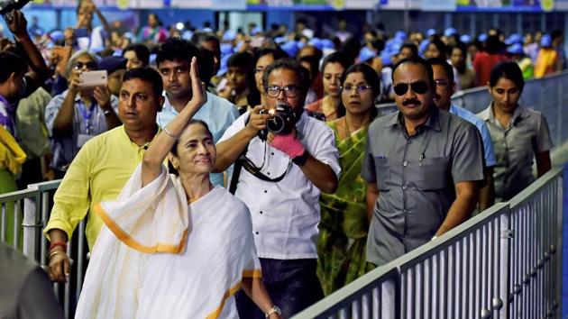 West Bengal Chief Minister Mamata Banerjee greets students as she arrives to attend the 5th anniversary of ‘Kanyasree Diwas’ at Netaji Indoor Stadium in Kolkata. (PTI) West Bengal Chief Minister Mamata Banerjee greets students as she arrives to attend the 5th anniversary of ‘Kanyasree Diwas’ at Netaji Indoor Stadium in Kolkata. (PTI)