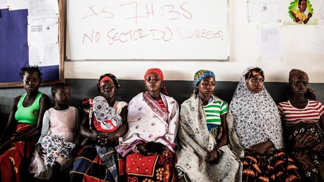 Mozambican women and expecting mothers wait to receive medical care at the Murrupelane Maternity ward in Nacala, Nampula Province. Child marriage and teen pregnancy rates in Mozambique are among the highest in the world, a driving factor in the population explosion in this southern African nation. Emerging from a brutal war in 1992, the former Portuguese colony saw its population swell 40% in the two decades to 2017, reaching 29 million today. (Gianluigi Guercia / AFP) Mozambican women and expecting mothers wait to receive medical care at the Murrupelane Maternity ward in Nacala, Nampula Province. Child marriage and teen pregnancy rates in Mozambique are among the highest in the world, a driving factor in the population explosion in this southern African nation. Emerging from a brutal war in 1992, the former Portuguese colony saw its population swell 40% in the two decades to 2017, reaching 29 million today. (Gianluigi Guercia / AFP)